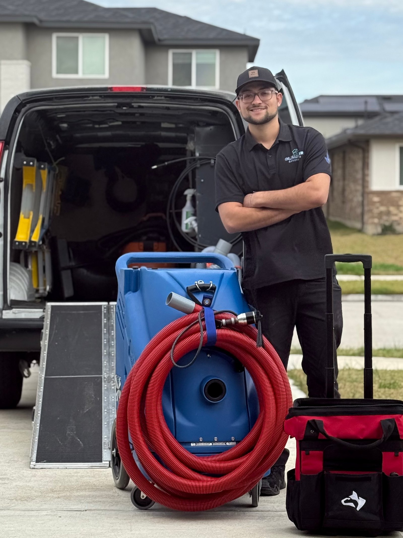ClearAir Solutions technician cleaning air ducts in Cypress