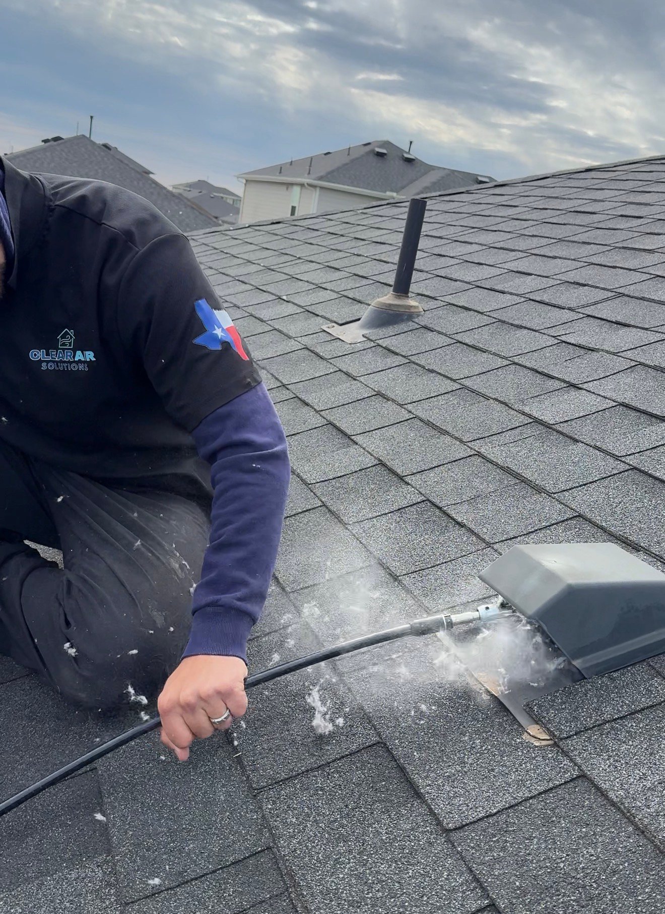 Rooftop dryer vent cleaning in Cypress